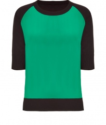 Quietly elegant and effortlessly cool, Jil Sanders black and green top ups the ante on preppy chic - Fashionably colorblocked in green silk and black wool - Elbow-length raglan sleeves and classic crew neck - Rib trim at cuffs, hem and collar - Slim yet relaxed cut - Polished and undeniably cool, ideal for pairing with pencil skirts, skinny denim or cigarette pants Quietly elegant and effortlessly cool, Jil Sanders black and green top ups the ante on preppy chic - Fashionably colorblocked in green silk and black wool - Elbow-length raglan sleeves and classic crew neck - Rib trim at cuffs, hem and collar - Slim yet relaxed cut - Polished and undeniably cool, ideal for pairing with pencil skirts, skinny denim or cigarette pants