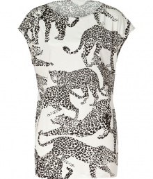 Take a walk on the wild side with Salonis eye-catching leopard printed silk top, the perfectly fashion-forward accent to polished business to cocktails looks - Rounded neckline, dolman cap sleeves, pull-over style - Easy feminine fit - Tuck into pencil skirts and finish with platform peep-toes, or try with leather leggings and statement carryall totes Take a walk on the wild side with Salonis eye-catching leopard printed silk top, the perfectly fashion-forward accent to polished business to cocktails looks - Rounded neckline, dolman cap sleeves, pull-over style - Easy feminine fit - Tuck into pencil skirts and finish with platform peep-toes, or try with leather leggings and statement carryall totes
