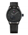 Go against the grain with this textured leather watch from Tommy Hilfiger. Crafted of black textured leather strap and round black ion-plated stainless steel case. Black dial features numerals at twelve and six o'clock, applied stick indices, white hour and minute hands, black second hand, and iconic logo at twelve o'clock. Automatic movement. Water resistant to 30 meters. Ten-year limited warranty.