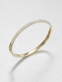From the Brilliance Collection. Half of this graceful bangle is paved with sparkling rhinestones, the other half has a smooth, polished finish, with a handy hinge in between.GlassGoldtoneDiameter, about 2.5Hinged with push-lock claspImported From the Brilliance Collection. Half of this graceful bangle is paved with sparkling rhinestones, the other half has a smooth, polished finish, with a handy hinge in between.GlassGoldtoneDiameter, about 2.5Hinged with push-lock claspImported
