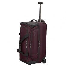 Cargo bag with removable padded shoulder strap. Rear zippered pocket with bottom zipper converts to a sleeve for sliding over wheeled handle systems Cargo bag with removable padded shoulder strap. Rear zippered pocket with bottom zipper converts to a sleeve for sliding over wheeled handle systems