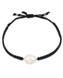 Give peace a chance! This trendy wrap bracelet features a 14k gold peace sign charm strung from a black nylon rope cord. Approximate diameter: 2-1/4 inches (extends to 3-1/2 inches). Give peace a chance! This trendy wrap bracelet features a 14k gold peace sign charm strung from a black nylon rope cord. Approximate diameter: 2-1/4 inches (extends to 3-1/2 inches).