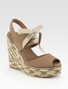 Braided hemp wedge and platform in a two-tone design, topped with a soft canvas upper and lace-up front. Braided hemp wedge, 5 (125mm)Braided hemp platform, 1 (25mm)Compares to a 4 heel (100mm)Canvas upperCanvas liningRubber solePadded insoleImportedOUR FIT MODEL RECOMMENDS ordering true whole size; ½ sizes should order the next whole size up. Braided hemp wedge and platform in a two-tone design, topped with a soft canvas upper and lace-up front. Braided hemp wedge, 5 (125mm)Braided hemp platform, 1 (25mm)Compares to a 4 heel (100mm)Canvas upperCanvas liningRubber solePadded insoleImportedOUR FIT MODEL RECOMMENDS ordering true whole size; ½ sizes should order the next whole size up.