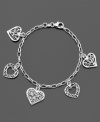 Embrace a charm bracelet full of heart. Features intricate heart-shaped charms. Crafted in sterling silver by Giani Bernini. Approximate length: 7-1/2 inches.