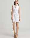 Delicate eyelet embellishment and a ruffle neckline elevate this lovely Lilly Pulitzer day dress.