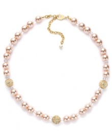 Pretty in pink. Charter Club's sweet style adds a touch of femininity to any look. Collar necklace is crafted in gold tone mixed metal with pink simulated pearls and glass fireballs. Approximate length: 16 inches + 2-inch extender. Pretty in pink. Charter Club's sweet style adds a touch of femininity to any look. Collar necklace is crafted in gold tone mixed metal with pink simulated pearls and glass fireballs. Approximate length: 16 inches + 2-inch extender.