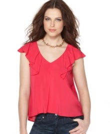 Ruffles make BCBGeneration's top more than a little sultry - pair with jeans and heels for a hot night out! Ruffles make BCBGeneration's top more than a little sultry - pair with jeans and heels for a hot night out!