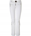 Make a chic statement on the slopes in Jet Sets ultra modern stretch ski pants, finished with a flattering cut guaranteed to show off your sporty side in style - Zip fly, zippered front pockets, adjustable belt in front, straight leg with silver star circle print, flared zippered ankles, partially lined legs from the hemline to thigh, elasticized band at the thigh with silicon for hold - Fitted through the knee - Wear with figure-hugging turtlenecks and cozy shearling lined boots