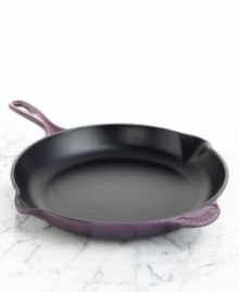 A classic kitchen workhorse, Le Creuset's heavyweight skillet is a culinary tradition crafted to sear and fry with professional precision. The expertly enameled cast iron exterior ensures uniform heating and even cooking, while the satin black enamel interior seals in juices and flavors. Limited lifetime warranty. A classic kitchen workhorse, Le Creuset's heavyweight skillet is a culinary tradition crafted to sear and fry with professional precision. The expertly enameled cast iron exterior ensures uniform heating and even cooking, while the satin black enamel interior seals in juices and flavors. Limited lifetime warranty.