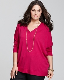 This refined knit basic by Eileen Fisher flatters in pure wool, styled in a long boxy silhouette that exudes effortless chic. This refined knit basic by Eileen Fisher flatters in pure wool, styled in a long boxy silhouette that exudes effortless chic.