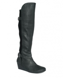With their wedge silhouette and buckle hardware embellishment, Unlisted's Chip N Dip tall boots take a trendy turn this fall. Stretch material behind the calf and a low wedge heel guarantee a comfortable fit. With their wedge silhouette and buckle hardware embellishment, Unlisted's Chip N Dip tall boots take a trendy turn this fall. Stretch material behind the calf and a low wedge heel guarantee a comfortable fit.
