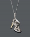 Sparkling style for the shoe-loving sister. This fashionable pendant features a high-heeled booty design decorated in round-cut champagne diamonds (1/2 ct. t.w.) and black diamonds (1/4 ct. t.w.). Chain and setting crafted in 14k white gold with a 14k gold heel. Approximate length: 18 inches. Approximate drop: 1/2 inch.