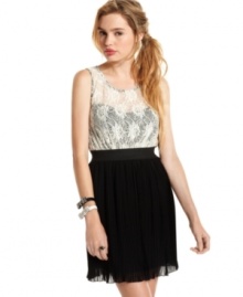 Miss Chevious joins a lace top with a skirt of fine pleats on a dress that's all about layered elegance! Miss Chevious joins a lace top with a skirt of fine pleats on a dress that's all about layered elegance!