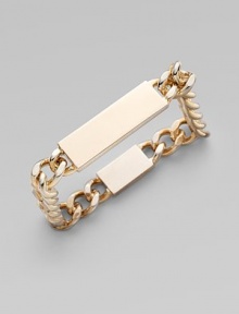 A classic brass piece in a constructed square shape. Brass Diameter, about 2½ Width, about ½ Push lock clasp Made in Italy A classic brass piece in a constructed square shape. Brass Diameter, about 2½ Width, about ½ Push lock clasp Made in Italy