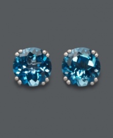 Dip into cool, blue hues. Round-cut London blue topaz (4-1/2 ct. t.w.) stud earrings are certain to make a splash! Crafted in 14k white gold. Approximate diameter: 8 mm. Dip into cool, blue hues. Round-cut London blue topaz (4-1/2 ct. t.w.) stud earrings are certain to make a splash! Crafted in 14k white gold. Approximate diameter: 8 mm.
