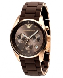 Beat the blues with this warm-hued watch by Emporio Armani. Brown silicone-wrapped gold tone stainless steel bracelet and round case. Brown chronograph dial with gold tone numerals, logo, date window and three subdials. Quartz movement. Water resistant to 50 meters. Two-year limited warranty. Beat the blues with this warm-hued watch by Emporio Armani. Brown silicone-wrapped gold tone stainless steel bracelet and round case. Brown chronograph dial with gold tone numerals, logo, date window and three subdials. Quartz movement. Water resistant to 50 meters. Two-year limited warranty.