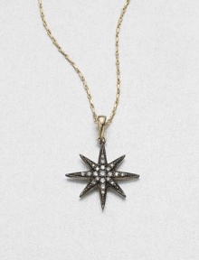 Twinkle, twinkle, diamond star, this starburst-shaped pendant of oxidized sterling silver hangs from a graceful 14k gold chain.Diamonds, .12 tcwSterling silver and 14k yellow goldChain length, about 16Pendant diameter, about ¾Spring ring claspMade in USA