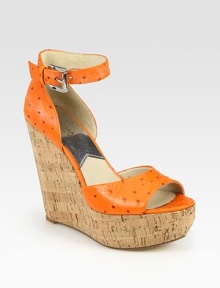 Rustic cork wedge topped with an ostrich-print leather upper and adjustable ankle strap. Cork wedge, 5 (125mm)Cork platform, 1½ (40mm)Compares to a 3½ heel (90mm)Ostrich-print leather upperLeather lining and solePadded insoleImported Rustic cork wedge topped with an ostrich-print leather upper and adjustable ankle strap. Cork wedge, 5 (125mm)Cork platform, 1½ (40mm)Compares to a 3½ heel (90mm)Ostrich-print leather upperLeather lining and solePadded insoleImported