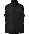The perfect silhouette for taking through the seasons, Woolrichs down vest is a timeless classic choice - Stand-up collar, snapped panel with hidden two-way zipper underneath, flap pockets - Straight slim fit - Wear with everything from long sleeve tees and jeans to cashmere pullovers and tailored trousers