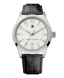 Timeless design with classic appeal, by Tommy Hilfiger. Watch crafted from black croc-embossed leather strap and round silvertone mixed metal case. Textured silvertone dial features applied numerals, date window at six o'clock and iconic flag logo. Quartz movement. Water resistant to 30 meters. Ten-year limited warranty. Timeless design with classic appeal, by Tommy Hilfiger. Watch crafted from black croc-embossed leather strap and round silvertone mixed metal case. Textured silvertone dial features applied numerals, date window at six o'clock and iconic flag logo. Quartz movement. Water resistant to 30 meters. Ten-year limited warranty.