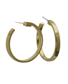 Snap up a style classic that adds an instant boost to your look. GUESS's traditional hoop earring features a gold tone mixed metal setting. Approximate diameter: 1 inch. Snap up a style classic that adds an instant boost to your look. GUESS's traditional hoop earring features a gold tone mixed metal setting. Approximate diameter: 1 inch.