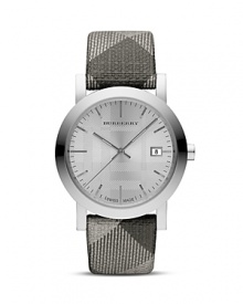Time check. Show off chic style with this eye-catching timepiece with shimmering checked leather strap from Burberry. Time check. Show off chic style with this eye-catching timepiece with shimmering checked leather strap from Burberry.