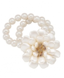 Take a turn down elegance avenue. Carolee's whimsical stretch bracelet features a large floral design that shimmers in white and clear glass beads. Accents crafted from gold tone mixed metal. Bracelet stretches to fit the wrist. Approximate diameter: 2-1/4 inches. Take a turn down elegance avenue. Carolee's whimsical stretch bracelet features a large floral design that shimmers in white and clear glass beads. Accents crafted from gold tone mixed metal. Bracelet stretches to fit the wrist. Approximate diameter: 2-1/4 inches.