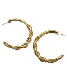 T Tahari puts its own stylish twist on this pair of hoop earrings from the Essentials Collection. Crafted from gold-tone mixed metal. Approximate diameter: 1-1/2 inches. T Tahari puts its own stylish twist on this pair of hoop earrings from the Essentials Collection. Crafted from gold-tone mixed metal. Approximate diameter: 1-1/2 inches.
