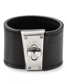 Pop and turnlock it with this tough-chic bracelet from MARC BY MARC JACOBS, which is crafted from leather. The bold brass hardware lends this chunky showpiece serious edge. Pop and turnlock it with this tough-chic bracelet from MARC BY MARC JACOBS, which is crafted from leather. The bold brass hardware lends this chunky showpiece serious edge.