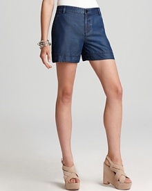 Cool it in deep blue MARC BY MARC JACOBS denim shorts, boasting a touch of boho for a weekend of '70s style. Cool it in deep blue MARC BY MARC JACOBS denim shorts, boasting a touch of boho for a weekend of '70s style.