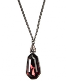 Deluxe design. Add an exquisite element to your evening wardrobe with this gorgeous Givenchy pendant necklace. Made in hematite tone mixed metal, it's embellished with glass accents in a rich vintage rose hue. Approximate length: 16 inches + 2-inch extender.