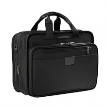When a meeting turns into an overnight trip, this expandable Briggs & Riley rolling briefcase helps you roll with the punches. The @Work boasts three sections: an organizer section, a removable sleeve that fits most 15.4 laptops and a divided fan file section that accommodates letter and legal size folders -- plus a change of clothes with a garment securing panel. Laptop sleeve can be tethered to the bag at security screenings reducing risk of damage or loss. Front organizer has multiple pockets, including padded pockets for gadgets. Coal chute holds a laptop power supply. Interlocking handle system allows for multiple bag stacking. When a meeting turns into an overnight trip, this expandable Briggs & Riley rolling briefcase helps you roll with the punches. The @Work boasts three sections: an organizer section, a removable sleeve that fits most 15.4 laptops and a divided fan file section that accommodates letter and legal size folders -- plus a change of clothes with a garment securing panel. Laptop sleeve can be tethered to the bag at security screenings reducing risk of damage or loss. Front organizer has multiple pockets, including padded pockets for gadgets. Coal chute holds a laptop power supply. Interlocking handle system allows for multiple bag stacking.