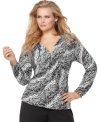 Show off your sassier side with Jones New York Signature's long sleeve plus size top, spotlighting a snakeskin print.