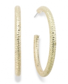 Gilded and gorgeous. Alfani's traditional hoop earrings feature a reflective diamond cut, lending a textured finish. Crafted in gold tone mixed metal. Approximate diameter: 2 inches. Gilded and gorgeous. Alfani's traditional hoop earrings feature a reflective diamond cut, lending a textured finish. Crafted in gold tone mixed metal. Approximate diameter: 2 inches.