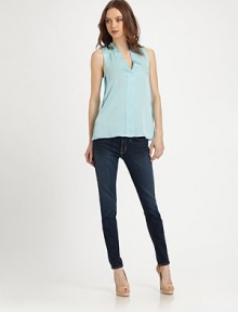Fronted by a banded v-neck, this lustrous silk blouse has unique paneling and a length that hits below the hips. V-neckSleevelessSilkDry cleanImportedModel shown is 5'10 (177cm) wearing US size Small. Fronted by a banded v-neck, this lustrous silk blouse has unique paneling and a length that hits below the hips. V-neckSleevelessSilkDry cleanImportedModel shown is 5'10 (177cm) wearing US size Small.