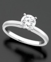 Take her breath away with this pristine engagement ring featuring round-cut diamond (1/2 ct. t.w.) set in 18k white gold.