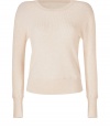 Reminiscent of that favorite thermal, Marc by Marc Jacobs waffle knit wool pullover is a cool choice destined to be an everyday favorite - Round neckline, long sleeves, smooth trim, allover waffle knit - Shorter, fitted silhouette - Wear with a tee and favorite skinny jeans