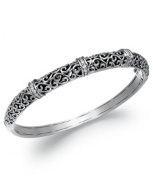 Inspire your look with something vintage. This elegant antique-themed bangle is adorned with rows of sparkling round-cut diamonds (1/4 ct. t.w.). Set in sterling silver filigree. Approximate diameter: 2-1/2 inches. Inspire your look with something vintage. This elegant antique-themed bangle is adorned with rows of sparkling round-cut diamonds (1/4 ct. t.w.). Set in sterling silver filigree. Approximate diameter: 2-1/2 inches.