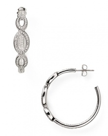 Crafted from rhodium plated metal and crystal stations, Nadri's open link hoop earrings encapsulate sophisticated accessorizing. Crafted from rhodium plated metal and crystal stations, Nadri's open link hoop earrings encapsulate sophisticated accessorizing.