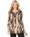 Neutral colors create an abstract print in this earthy tunic from JM Collection. Beading at the neckline adds a dressy touch, too!