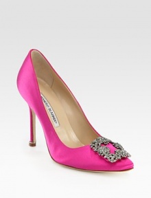 This timeless shape of elegant satin is embellished with luminous crystals.Self-covered heel, 4 (100mm) Pointed toe Leather lining and sole Padded insole Made in ItalyOUR FIT MODEL RECOMMENDS ordering one size up as this style runs small. This timeless shape of elegant satin is embellished with luminous crystals.Self-covered heel, 4 (100mm) Pointed toe Leather lining and sole Padded insole Made in ItalyOUR FIT MODEL RECOMMENDS ordering one size up as this style runs small.