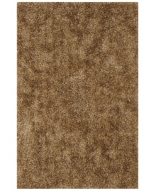 Add rich, shimmering texture to any modern room with the Metallic taupe area rug from Dalyn. Hand-tufted of soft polyester, this high-luster shag area rug puts comfort and fun back in floor decor. Add rich, shimmering texture to any modern room with the Metallic taupe area rug from Dalyn. Hand-tufted of soft polyester, this high-luster shag area rug puts comfort and fun back in floor decor.