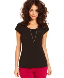 A peplum hem adds feminine flair to this Kensie top, a hot fall trend! A peplum hem adds feminine flair to this Kensie top, a hot fall trend!