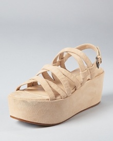 In a trend-right flatform silhouette, the Via Spiga Robin sandal infuses flattering height into a walking-friendly silhouette. In a trend-right flatform silhouette, the Via Spiga Robin sandal infuses flattering height into a walking-friendly silhouette.