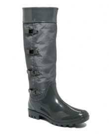 Stand up to rainy days with fashionable function. Tall Ivy rain boots by Calvin Klein crafted of nylon and rubber feature a row of fashion-forward snaps and buckles. Stand up to rainy days with fashionable function. Tall Ivy rain boots by Calvin Klein crafted of nylon and rubber feature a row of fashion-forward snaps and buckles.