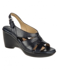 A solid wedge heel and sturdy strap detailing makes Naturalizer's Kirina slingback wedge sandals a perfectly practical choice for your summer wardrobe. With a round-toe silhouette, they're equipped with a secure adjustable buckle closure for support. A solid wedge heel and sturdy strap detailing makes Naturalizer's Kirina slingback wedge sandals a perfectly practical choice for your summer wardrobe. With a round-toe silhouette, they're equipped with a secure adjustable buckle closure for support.