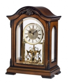 A timeless decorative accent, by Bulova. This solid wood mantel clock with an Old World walnut finish perfectly suits an office. Decoratively carved case with screened glass front and side panels and removable clear acrylic back houses a metal dial and revolving crystal pendulum. Plays Westminster melody on the hour. A timeless decorative accent, by Bulova. This solid wood mantel clock with an Old World walnut finish perfectly suits an office. Decoratively carved case with screened glass front and side panels and removable clear acrylic back houses a metal dial and revolving crystal pendulum. Plays Westminster melody on the hour.