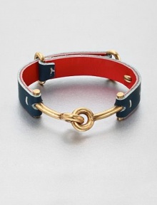 A modern and sleek design in leather and metal. LeatherBrassDiameter, about 2¼Hook closureImported A modern and sleek design in leather and metal. LeatherBrassDiameter, about 2¼Hook closureImported
