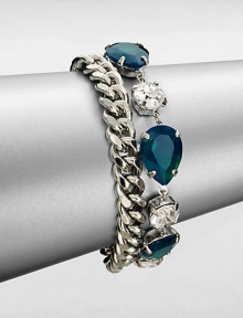 From the Black Tie Optional Collection. A chunky curb chain is joined by a row of emerald green and clear faceted stones in this fun design, the two strands creating a quirky complement to one another.Glass and plasticSilvertoneLength, about 8Ring claspImported From the Black Tie Optional Collection. A chunky curb chain is joined by a row of emerald green and clear faceted stones in this fun design, the two strands creating a quirky complement to one another.Glass and plasticSilvertoneLength, about 8Ring claspImported