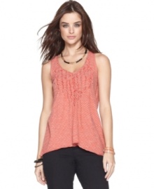 This soft cotton tank top offers laid-back style thanks to a chic A-line silhouette and uneven hem, from DKNY Jeans. This soft cotton tank top offers laid-back style thanks to a chic A-line silhouette and uneven hem, from DKNY Jeans.